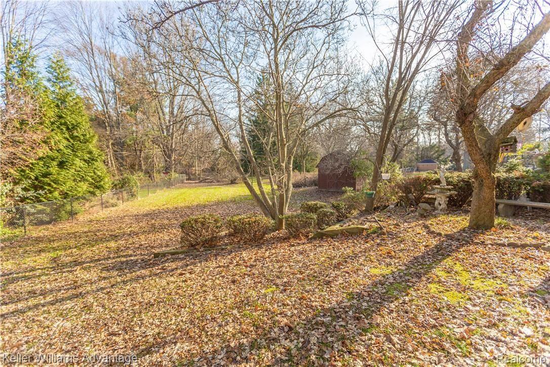 16724 Farmington Road Livonia, MI 48154 - Photo 46 of 57 View of backyard from driveway