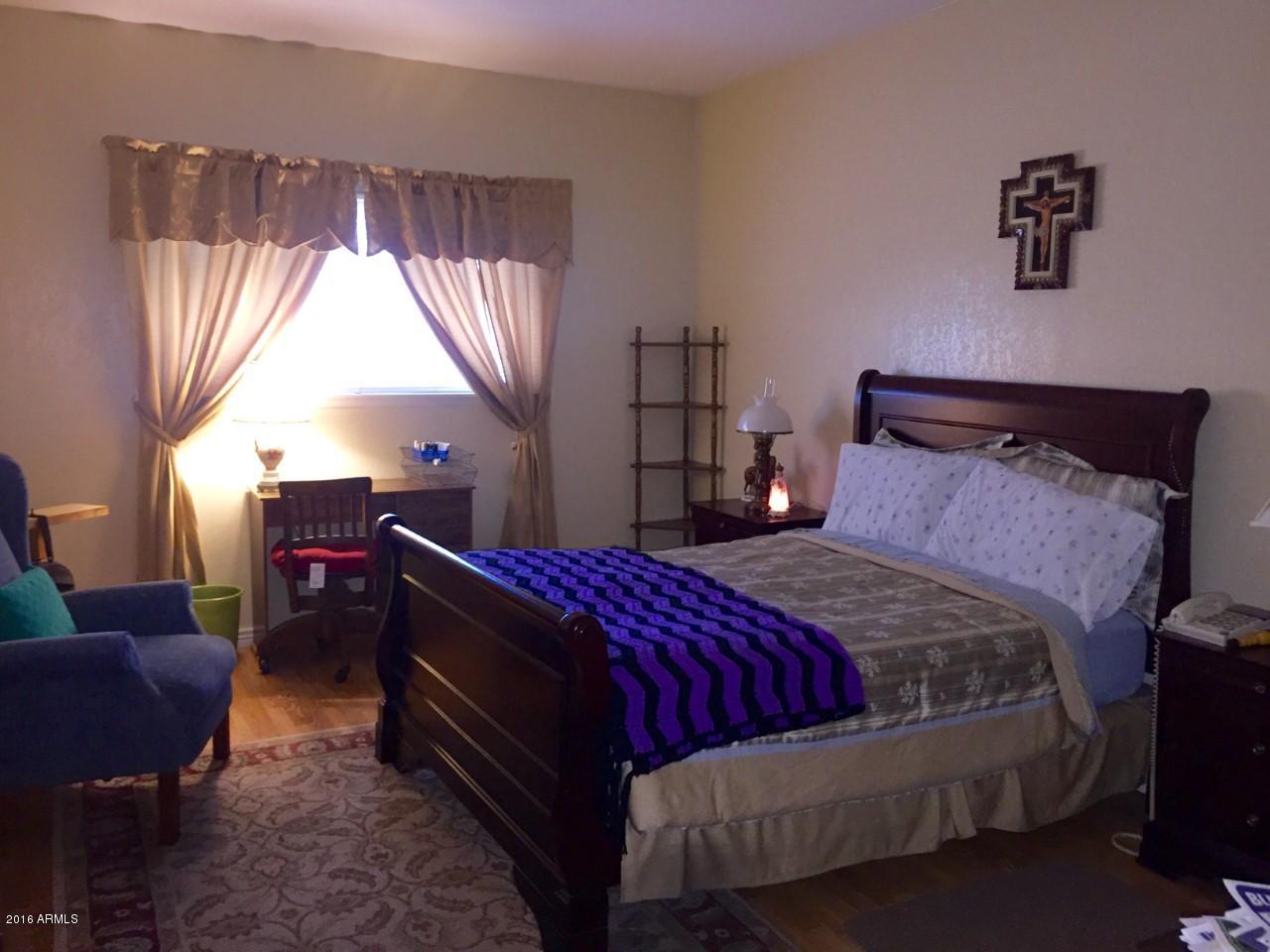 355 East Thomas Road, Unit B104 Phoenix, AZ 85012 - Photo 11 of 14 Master Bedroom