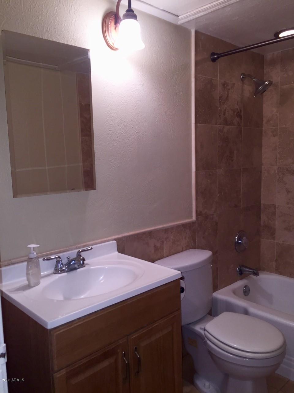 355 East Thomas Road, Unit B104 Phoenix, AZ 85012 - Photo 4 of 14 Hallway Bathroom