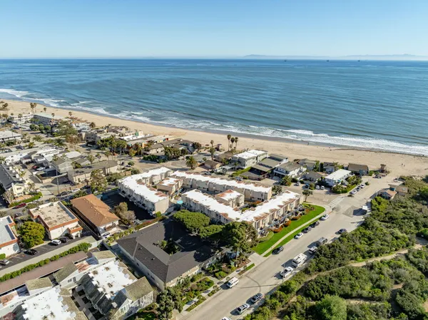 an aerial view of beach and ocean