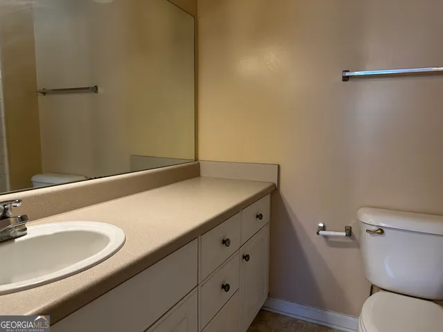 a bathroom with a sink and a toilet