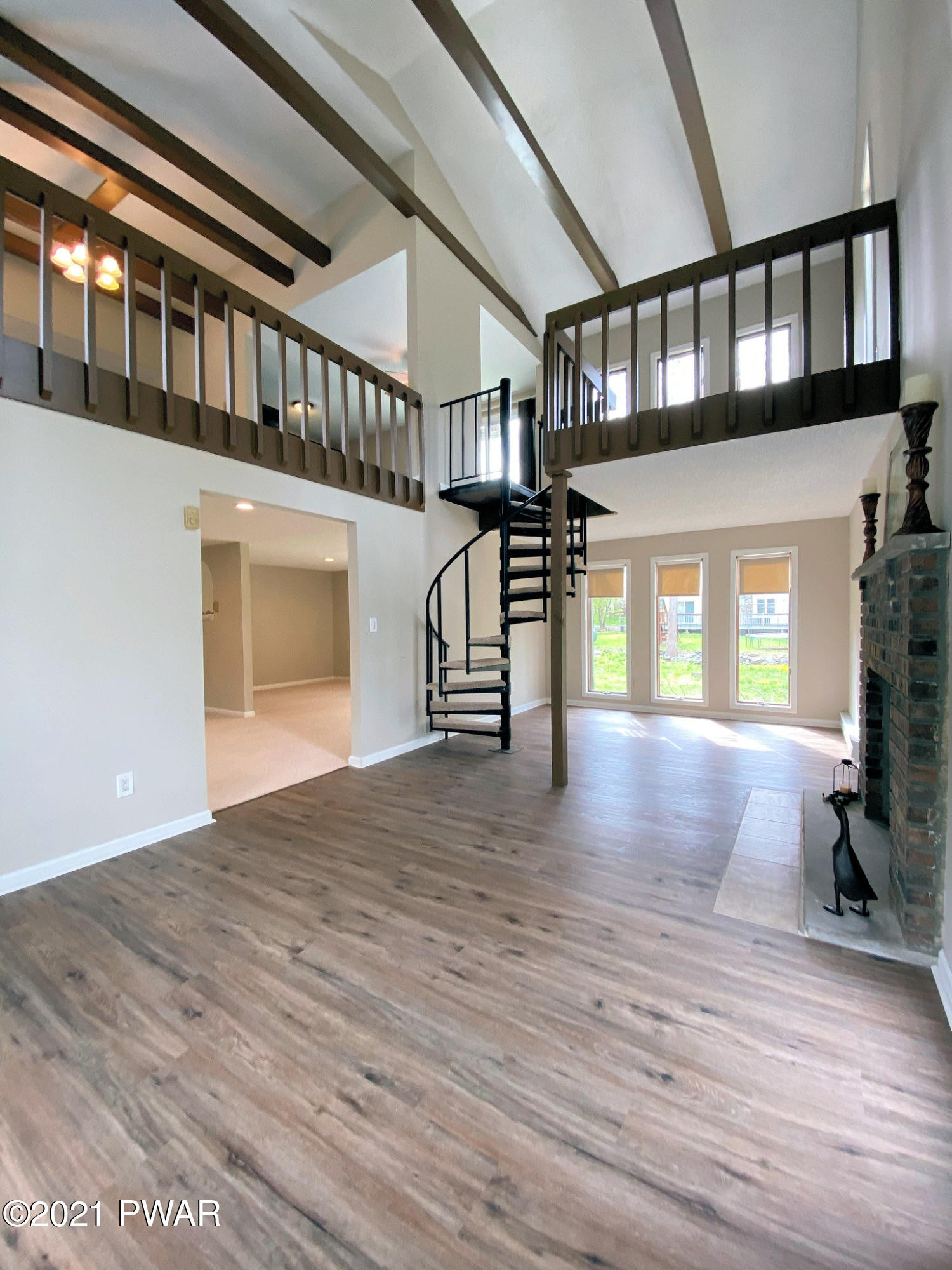 154 Heather Hill Road Dingmans Ferry, PA 18328 - Photo 3 of 58 3 Spiral Stairs Lead to Dining Area