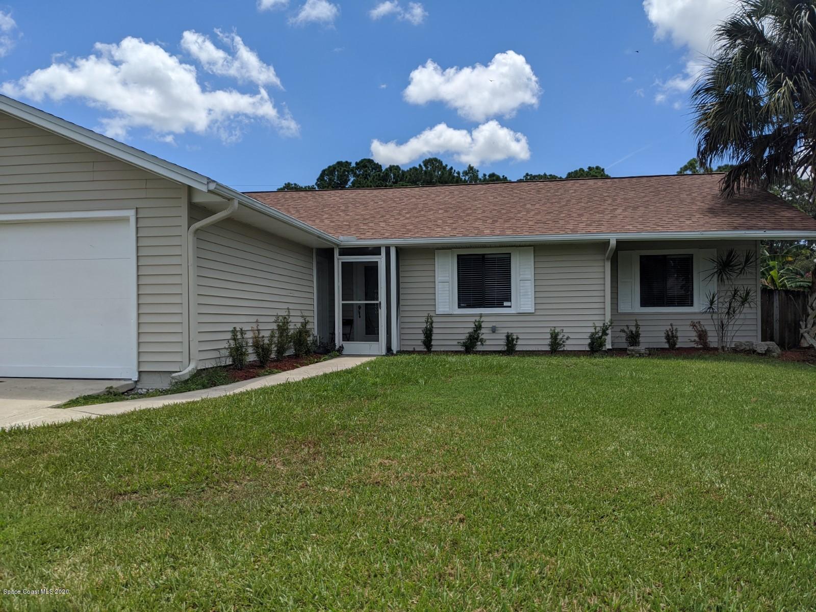 526 Rheine Road Northwest Palm Bay, FL 32907 - Photo 1 of 24 Front