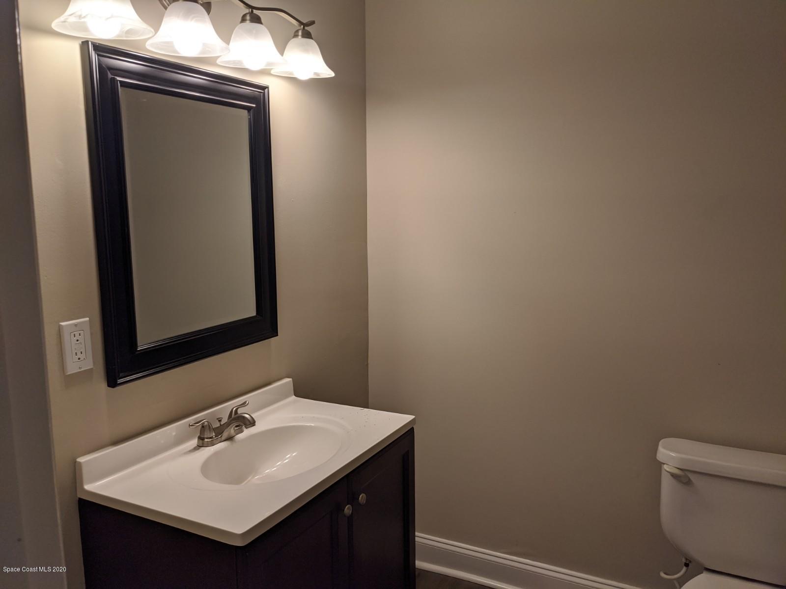 526 Rheine Road Northwest Palm Bay, FL 32907 - Photo 11 of 24 Guest bath with new flooring