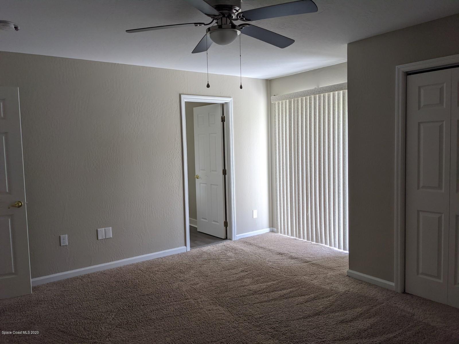 526 Rheine Road Northwest Palm Bay, FL 32907 - Photo 18 of 24 Master Bedroom