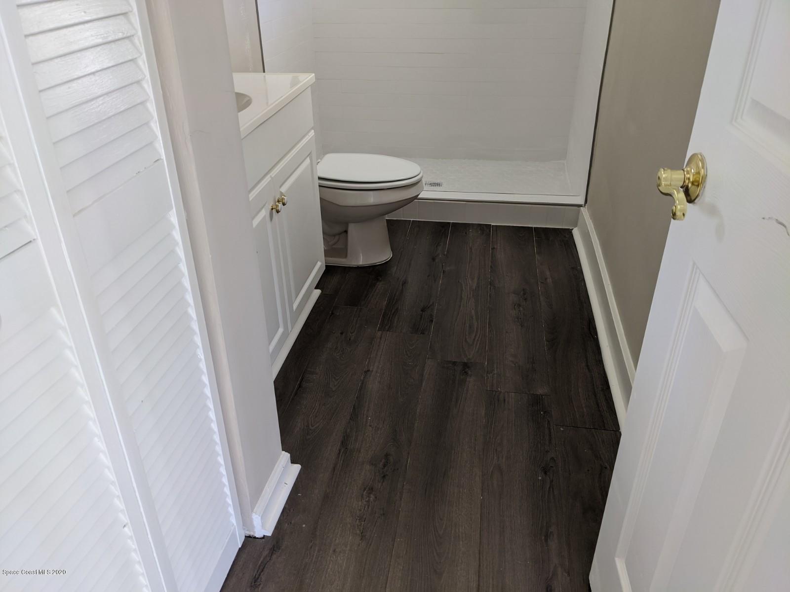 526 Rheine Road Northwest Palm Bay, FL 32907 - Photo 19 of 24 New Flooring Master bath