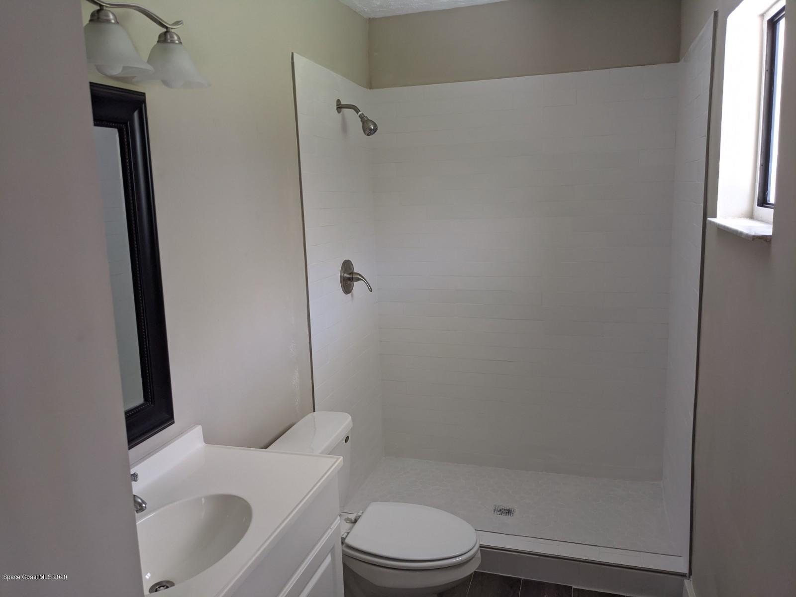 526 Rheine Road Northwest Palm Bay, FL 32907 - Photo 20 of 24 New Shower Master Bath