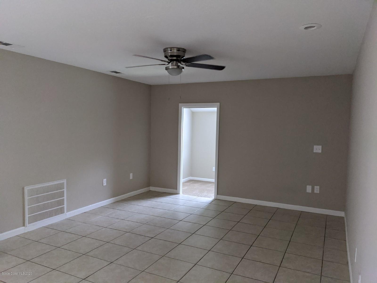 526 Rheine Road Northwest Palm Bay, FL 32907 - Photo 8 of 24 Living Room