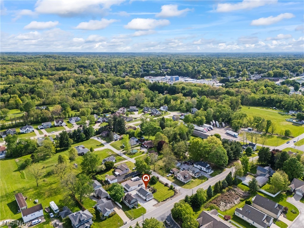 258 Randolph Road Mogadore, OH 44260 - Photo 46 of 49 Aerial view showcasing a residential area with varied home styles and expansive green spaces