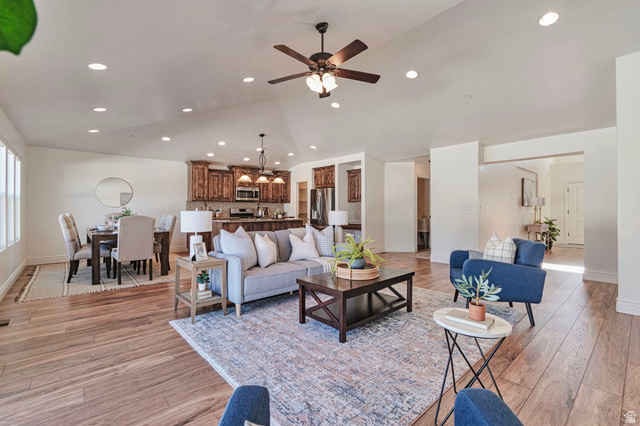 1288 North Horizon View Loop Elk Ridge, UT 84651 - Photo 4 of 40 Living room featuring light wood-style flooring, a ceiling fan, and recessed lighting