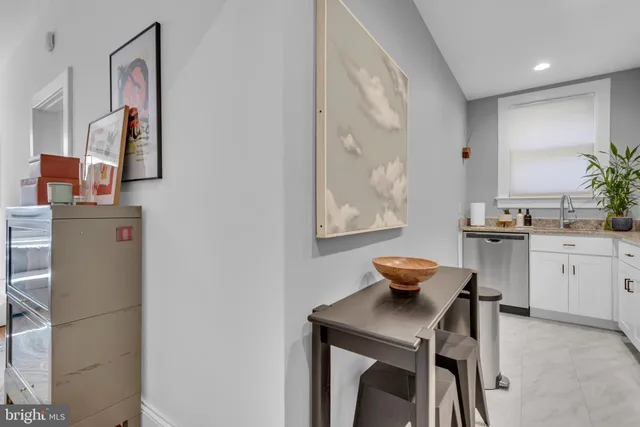 a kitchen with a stove and a sink