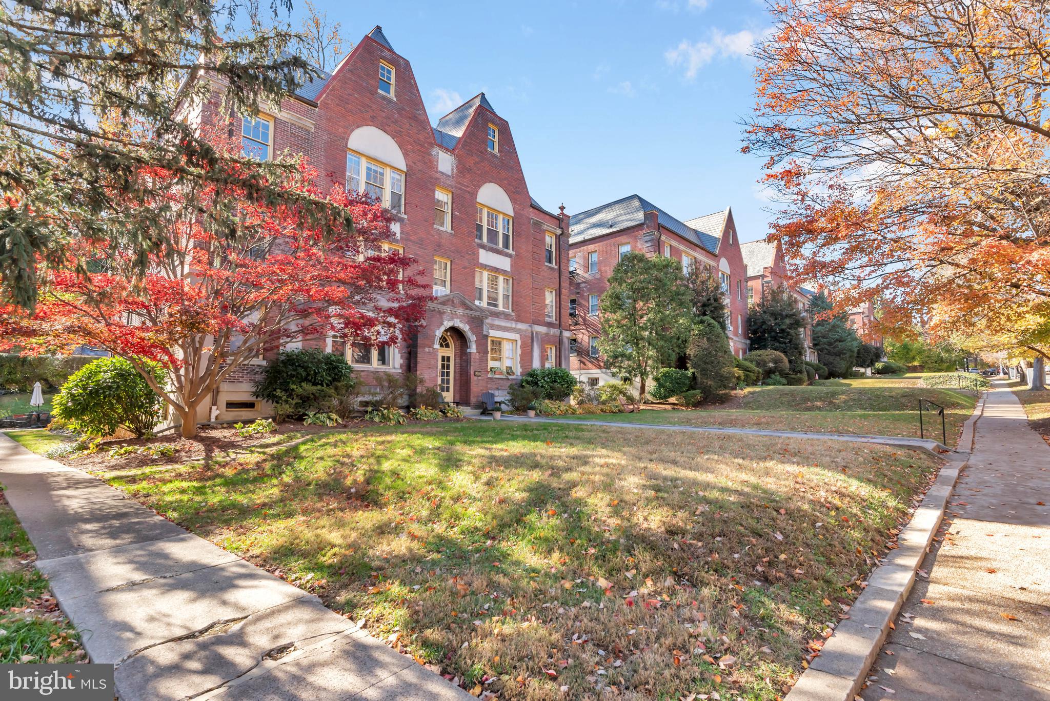 3020 Porter Street Northwest, Unit 103 Washington, DC 20008 - Photo 5 of 30 a view of a building with snow on the road