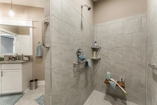 a bathroom with a sink and mirror