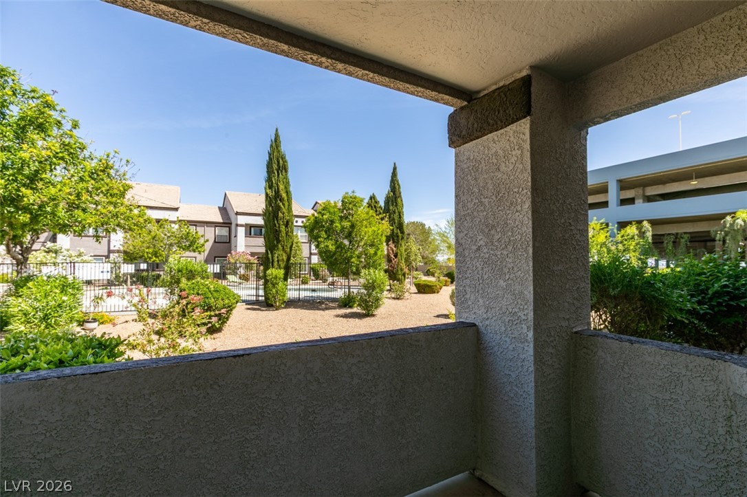 7255 West Sunset Road, Unit 1103 Las Vegas, NV 89113 - Photo 5 of 35 Enjoy views of the inviting pool and lush landscaping from this private balcony.