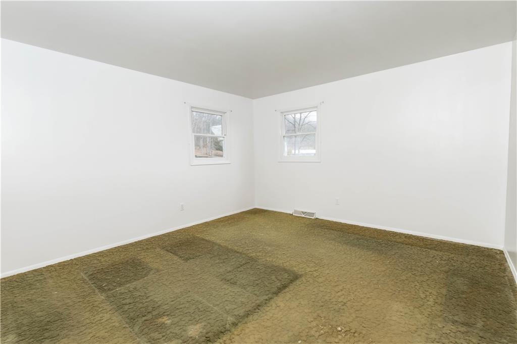 246 King Hill Road Indiana, PA 15701 - Photo 12 of 24 an empty room with a workbench