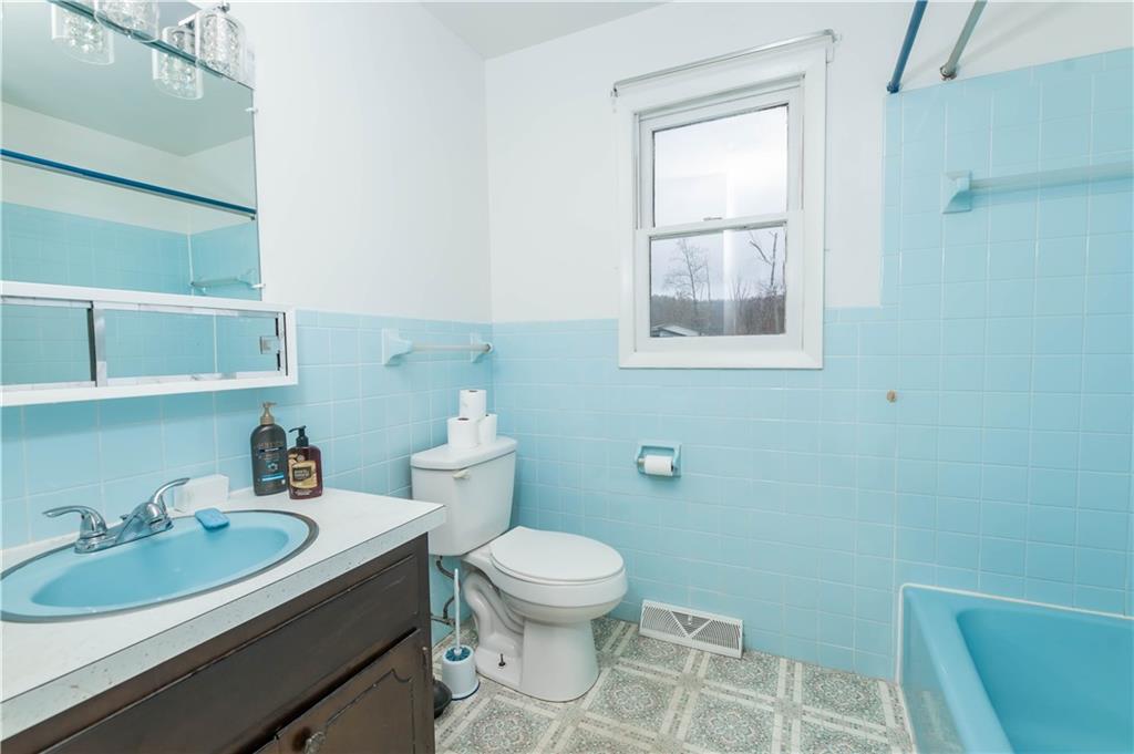 246 King Hill Road Indiana, PA 15701 - Photo 16 of 24 a bathroom with a sink toilet and a mirror