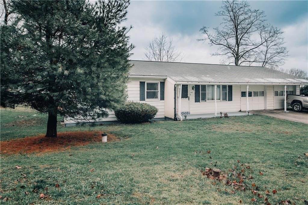 246 King Hill Road Indiana, PA 15701 - Photo 22 of 24 a house that has tree in front of it