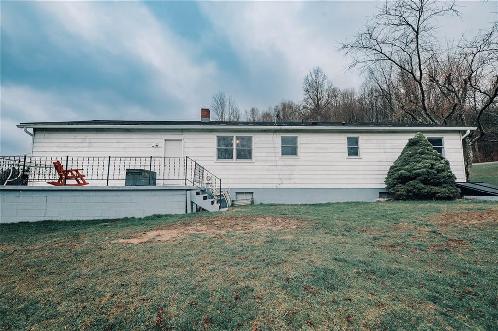 246 King Hill Road Indiana, PA 15701 - Photo 3 of 24 a view of a house with a back yard