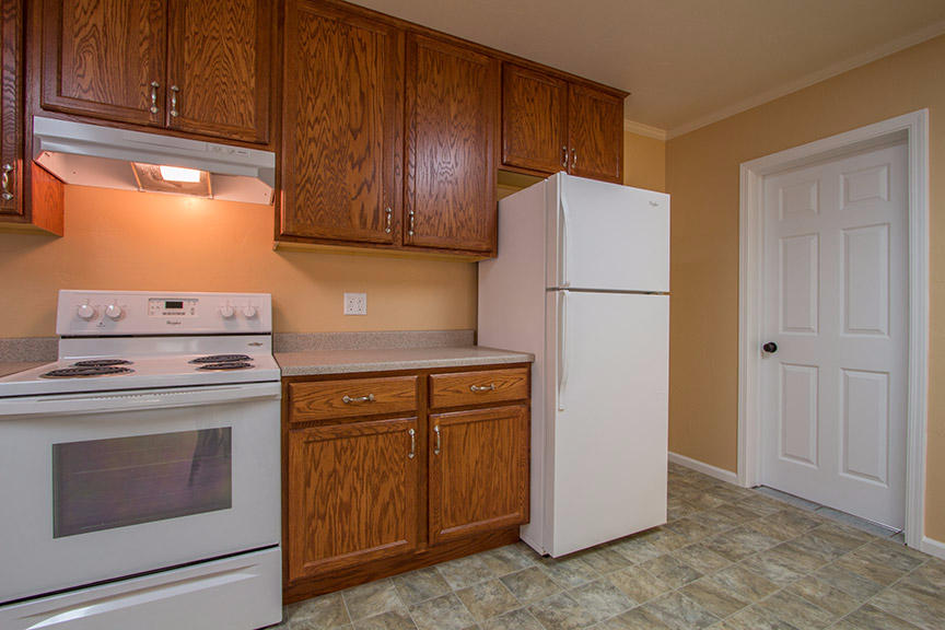 1732 Ash Street Fortuna, CA 95540 - Photo 11 of 37 a kitchen with a refrigerator sink stove and cabinets