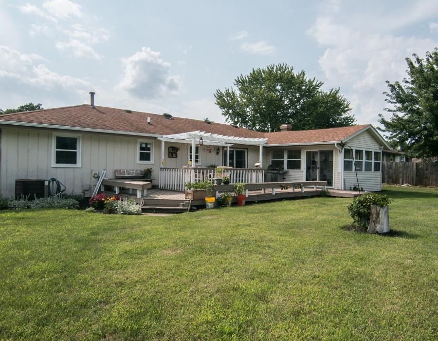 11725 Bend River Road Roscoe, IL 61073 - Photo 24 of 24 a view of a house with swimming pool and porch
