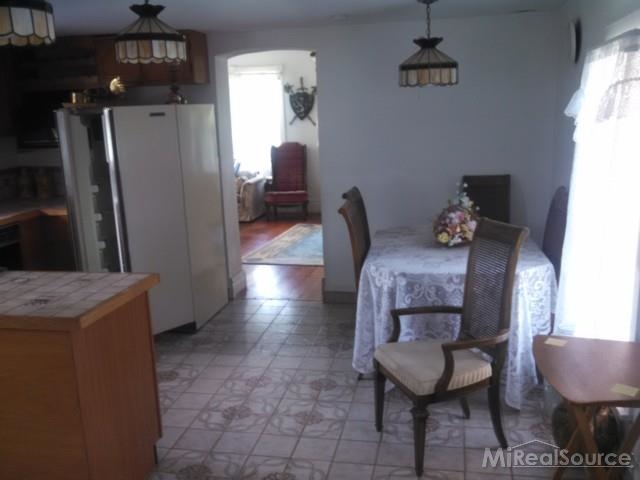 7663 Avoca Road Avoca, MI 48006 - Photo 3 of 23 This is another view of the kitchen.