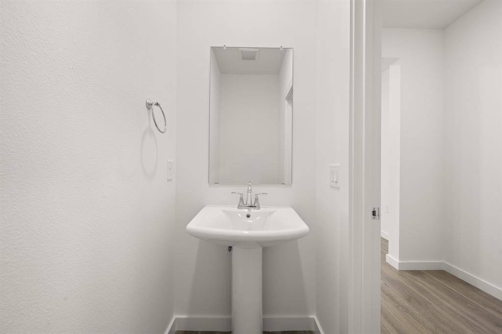 4611 Hawks Trail Oak Point, TX 75068 - Photo 16 of 40 4611 Haws Trail_ 2570_Lotus- Half Bath-1