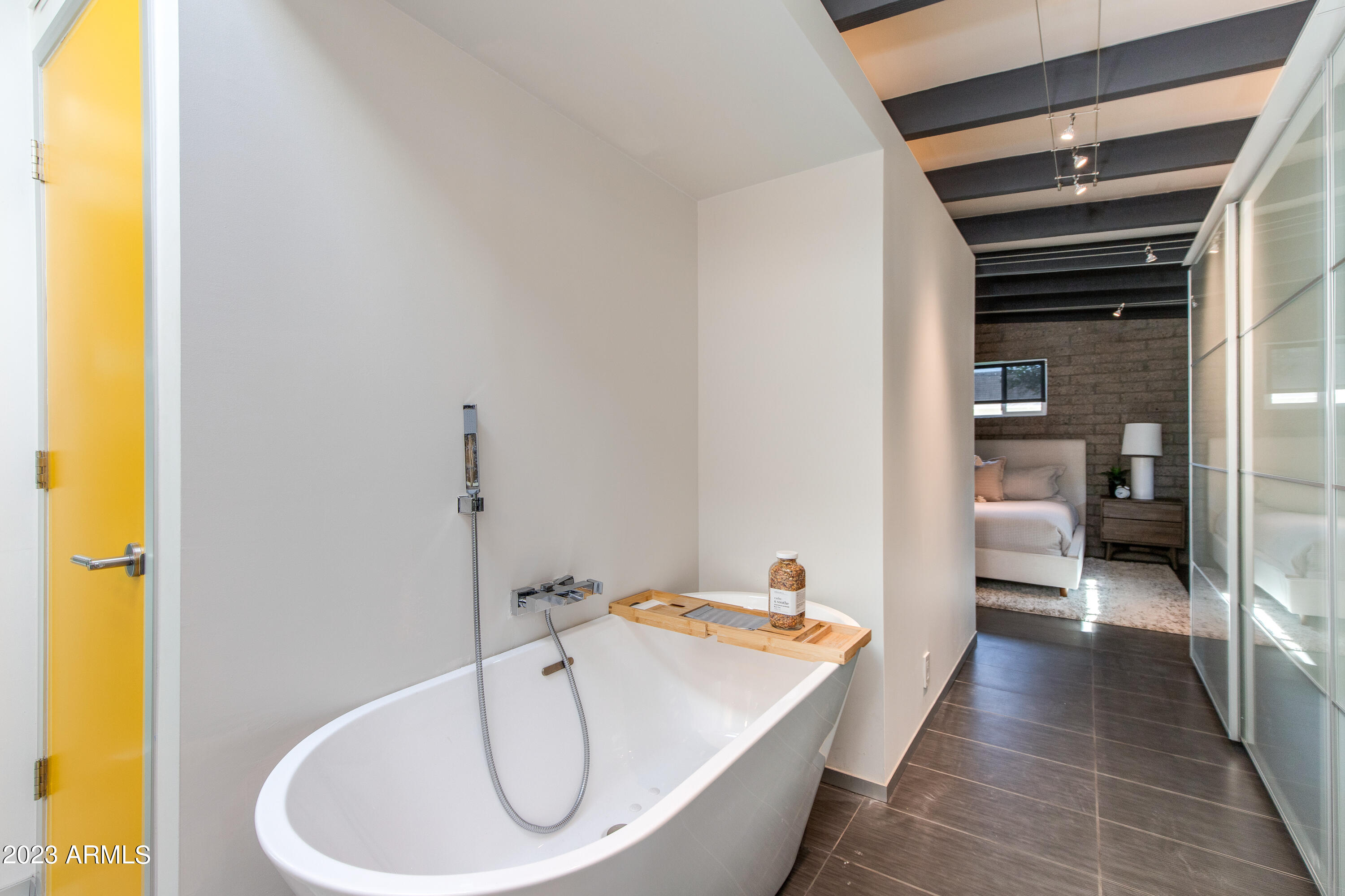 5719 North 11th Street Phoenix, AZ 85014 - Photo 12 of 18 a bathroom with a tub and sink