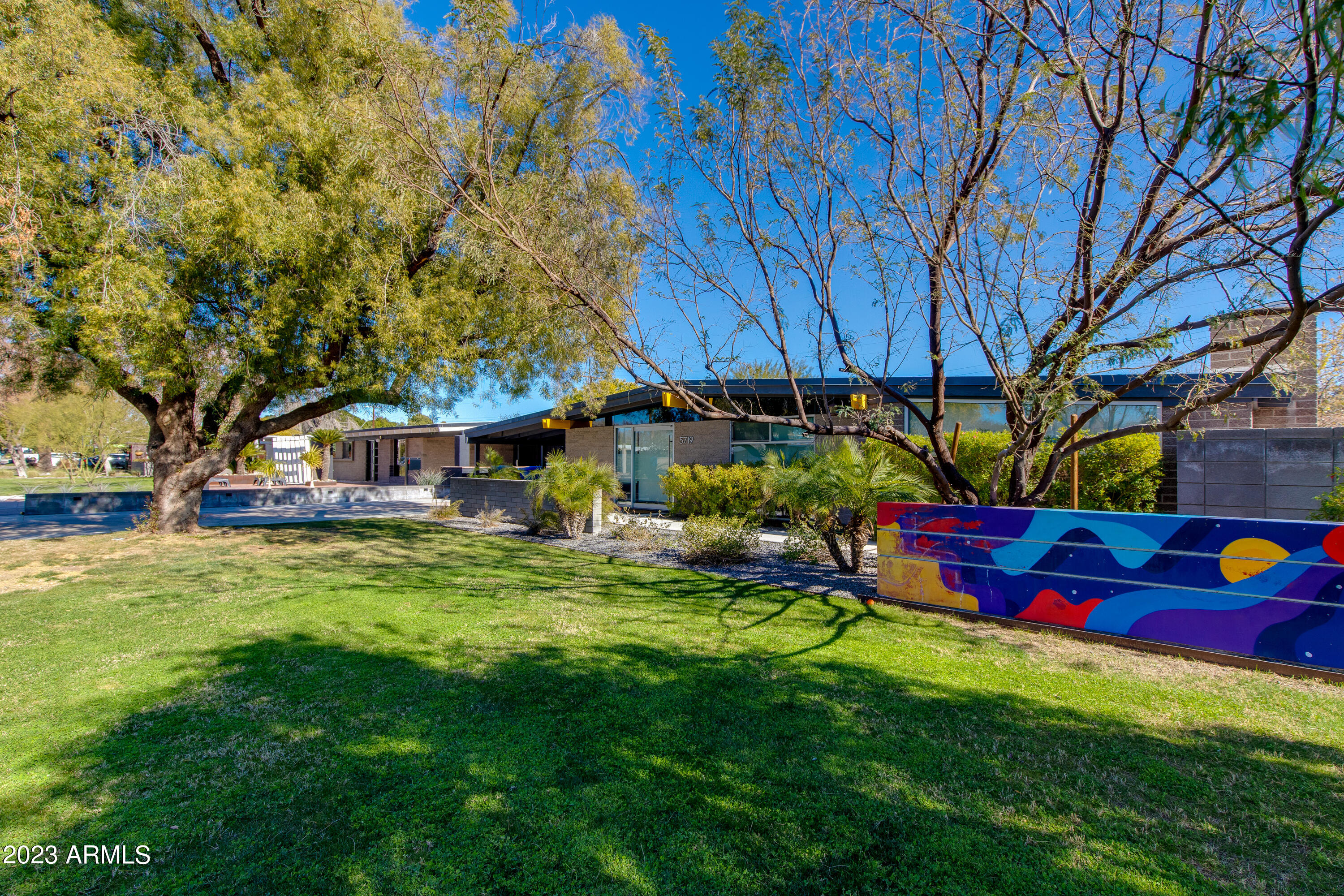 5719 North 11th Street Phoenix, AZ 85014 - Photo 2 of 18 a view of a house with a yard