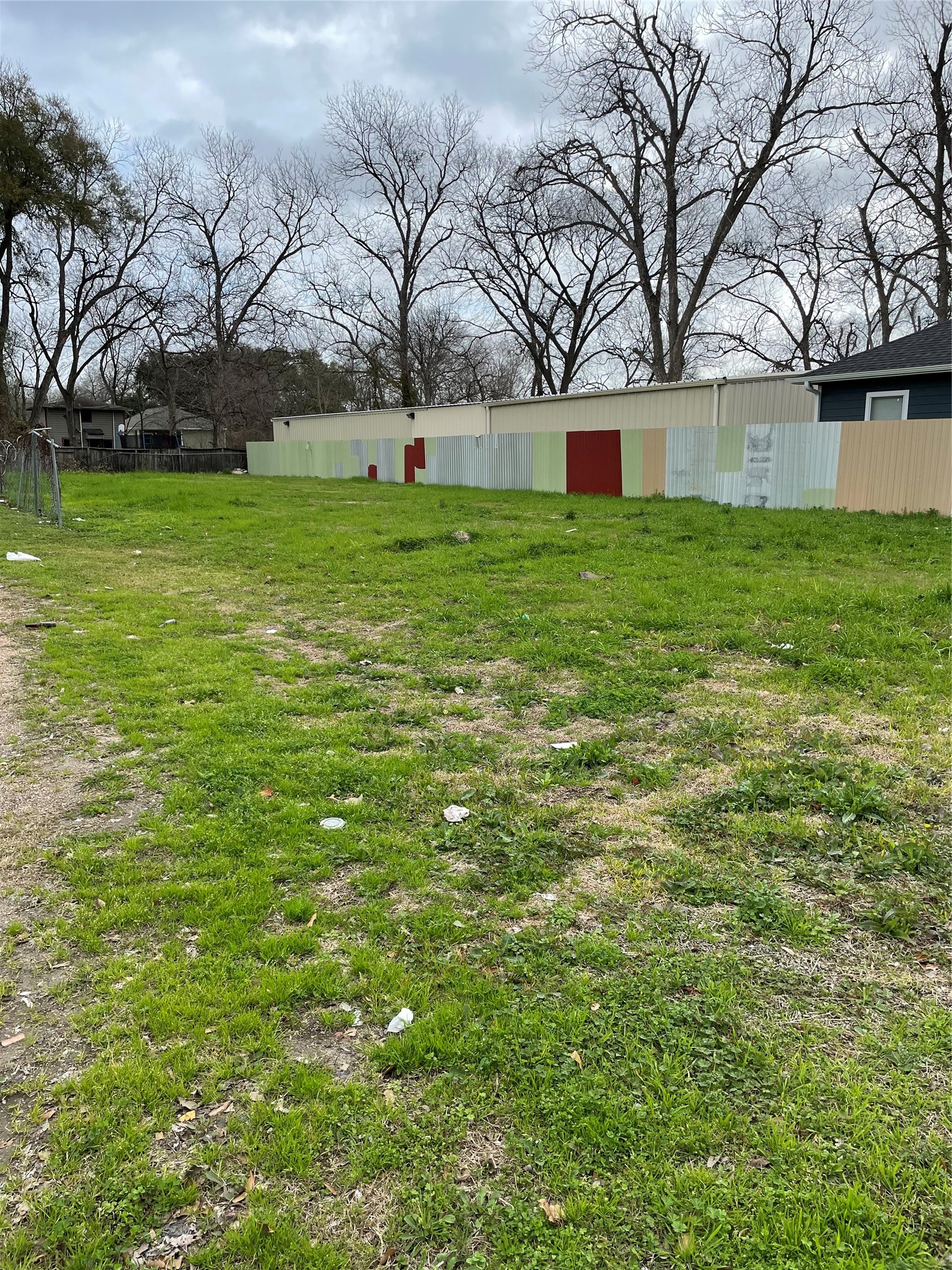 6726 West Montgomery Road Houston, TX 77091 - Photo 2 of 3 a view of a backyard with large trees