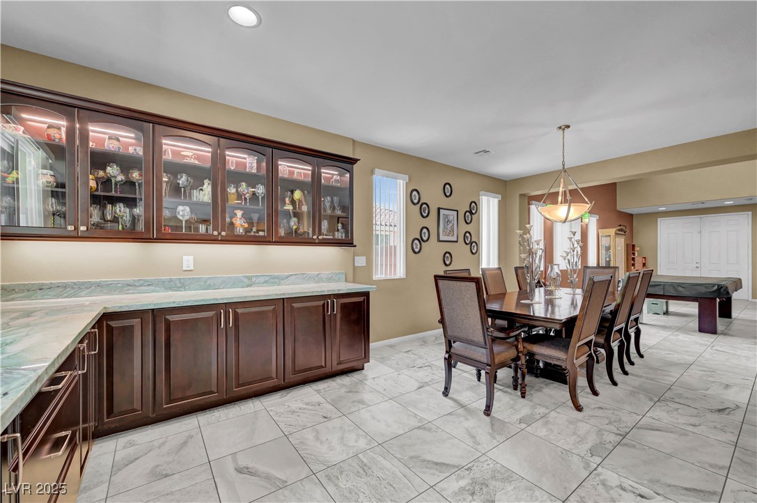 3930 Burma Road North Las Vegas, NV 89032 - Photo 16 of 73 Formal dining room with extended custom cabinets