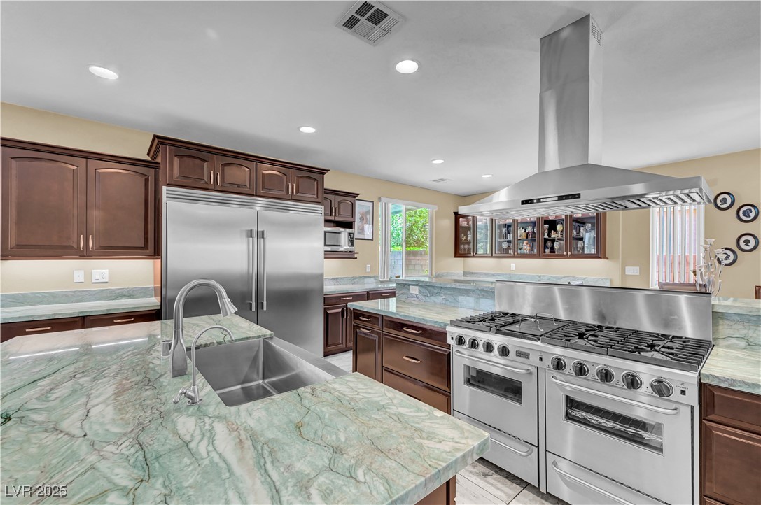 3930 Burma Road North Las Vegas, NV 89032 - Photo 25 of 73 Stainless steel stove features 6 burners, griddles, and two ovens plus vented hood