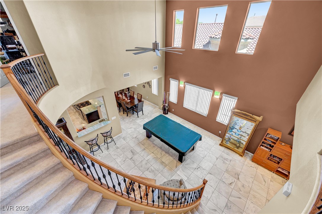 3930 Burma Road North Las Vegas, NV 89032 - Photo 35 of 73 Grand staircase to 2nd floor