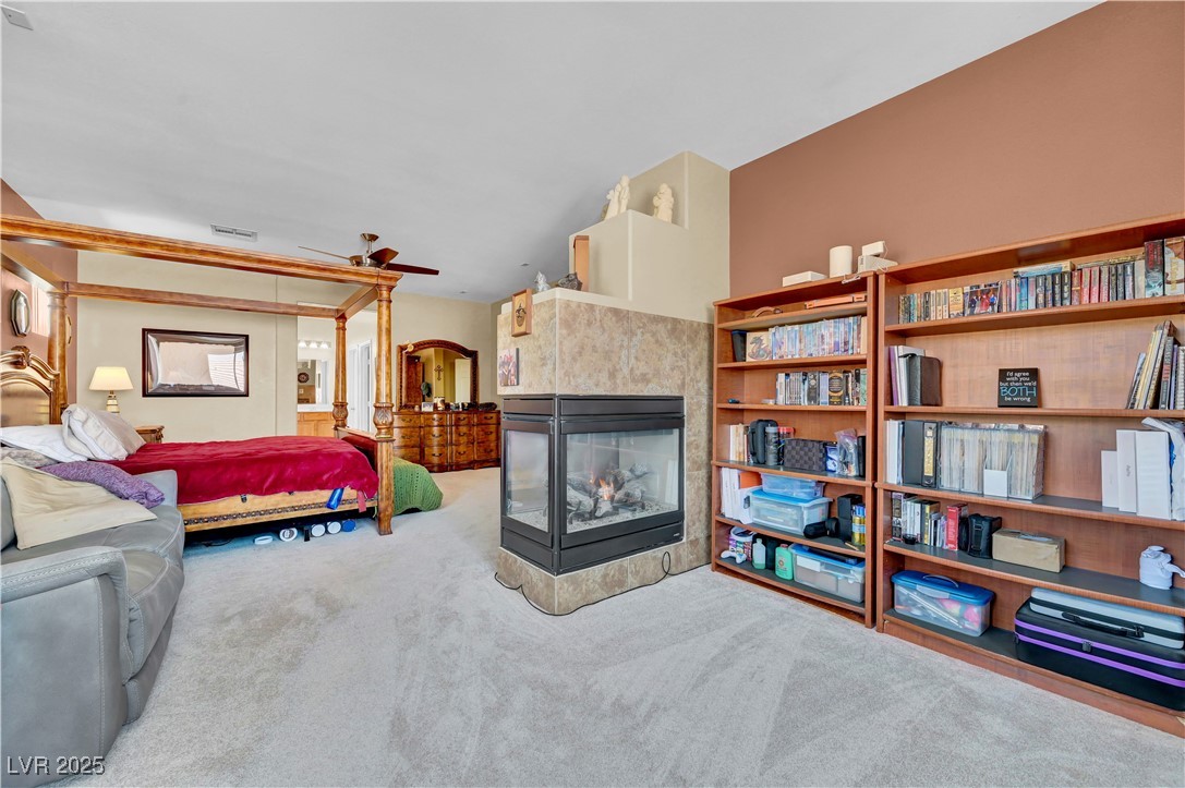 3930 Burma Road North Las Vegas, NV 89032 - Photo 41 of 73 Primary Bedroom 1 ~ features ceiling fan, surround sound