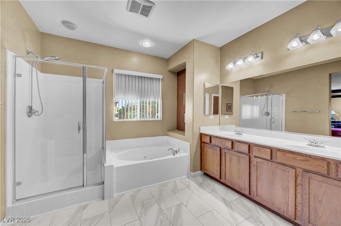 3930 Burma Road North Las Vegas, NV 89032 - Photo 44 of 73 Spa bath features double sinks