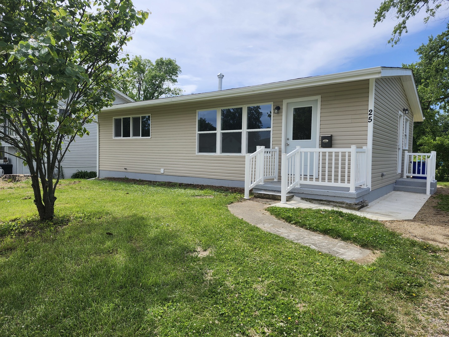 25 Ridge Ln Drive Decatur, IL 62521 - Photo 1 of 18 a house view with a garden space