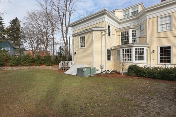 15 Kennard Road Brookline, MA 02445 - Photo 12 of 13 a view of a house with backyard and trees