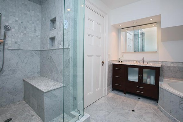 15 Kennard Road Brookline, MA 02445 - Photo 8 of 13 a bathroom with a sink and a mirror