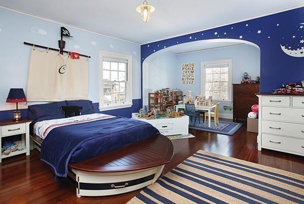 15 Kennard Road Brookline, MA 02445 - Photo 10 of 13 a bedroom with a bed and wooden floor