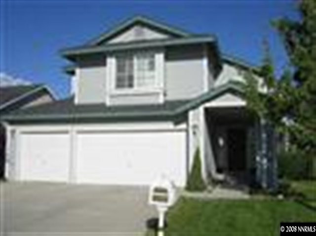 1388 Backer Way Reno, NV 89523 - Photo 1 of 9 a front view of a house with a yard