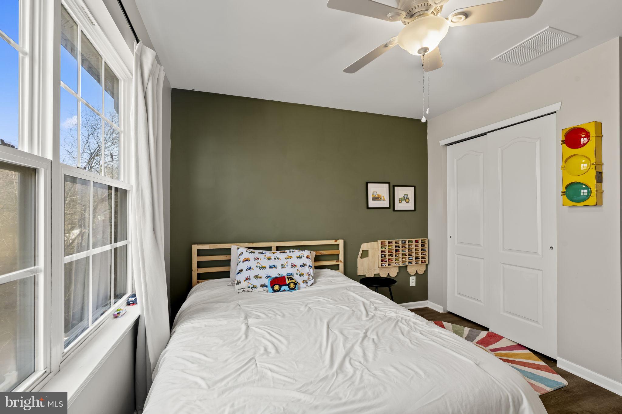 103 Oak Ridge Drive Mount Royal, NJ 08061 - Photo 18 of 34 a bedroom with a bed and a window