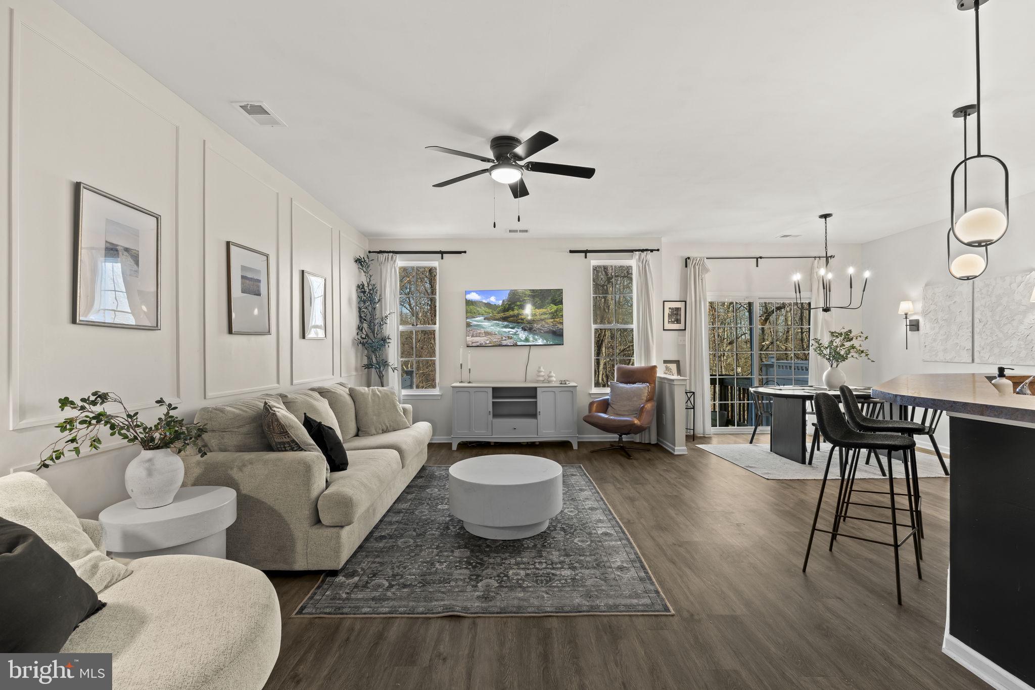 103 Oak Ridge Drive Mount Royal, NJ 08061 - Photo 5 of 34 a living room with furniture potted plant and white walls