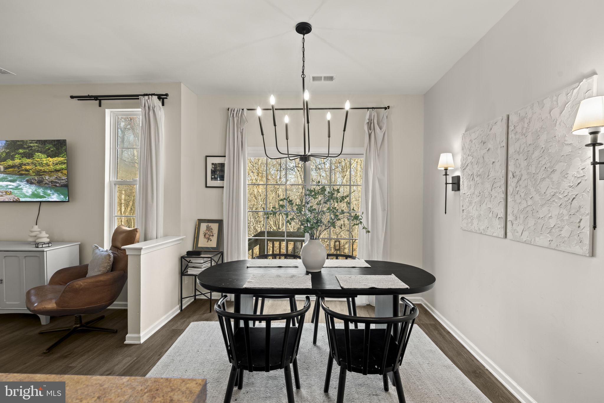 103 Oak Ridge Drive Mount Royal, NJ 08061 - Photo 8 of 34 a view of a dining room with furniture window and wooden floor