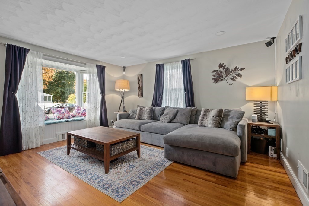 19 Manor Avenue Natick, MA 01760 - Photo 2 of 29 a living room with furniture and a window