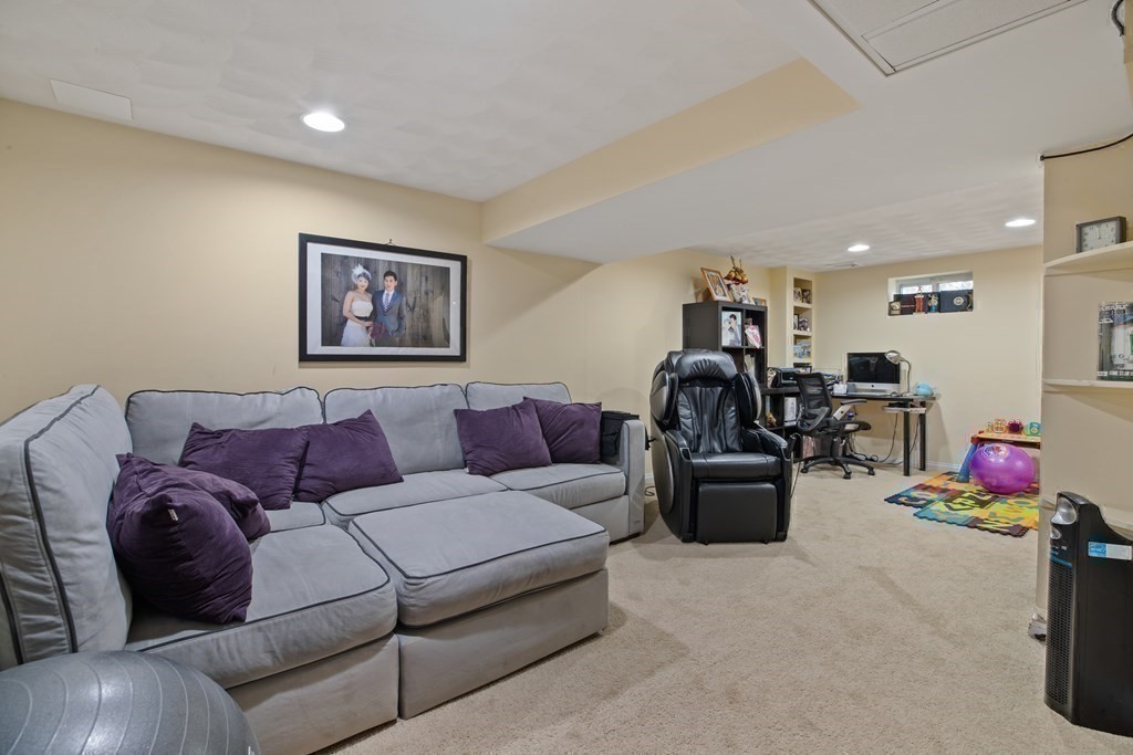 19 Manor Avenue Natick, MA 01760 - Photo 22 of 29 a living room with furniture