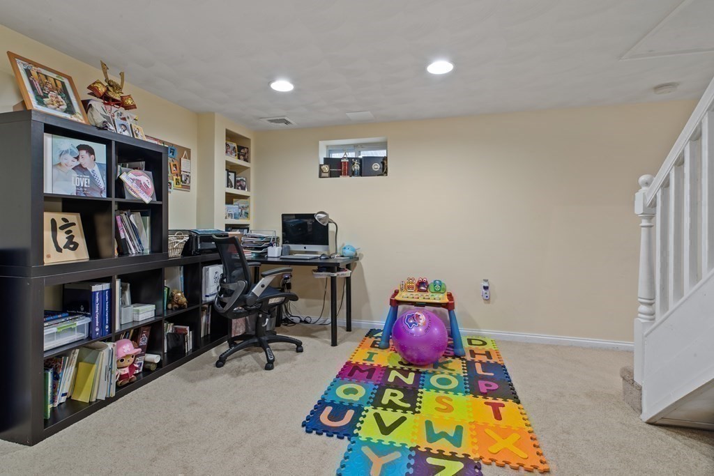 19 Manor Avenue Natick, MA 01760 - Photo 23 of 29 a view of a workspace with furniture and toys