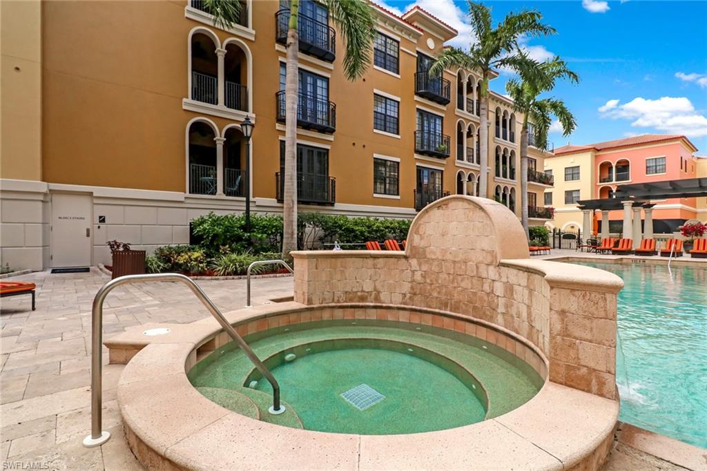 8011 Via Monte Carlo Way, Unit 2208 Estero, FL 33928 - Photo 28 of 34 a view of outdoor space yard swimming pool and porch