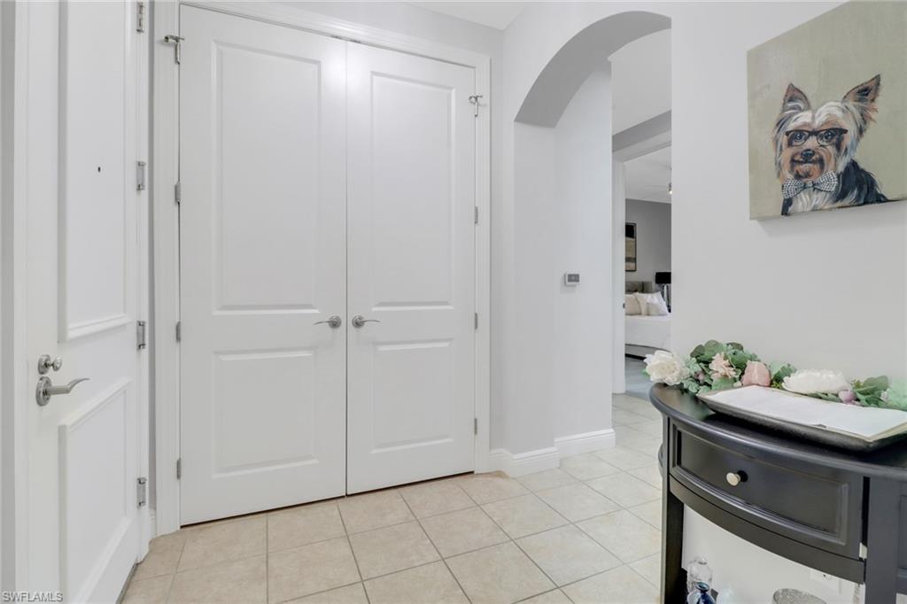 8011 Via Monte Carlo Way, Unit 2208 Estero, FL 33928 - Photo 3 of 34 a room that has a dresser in it