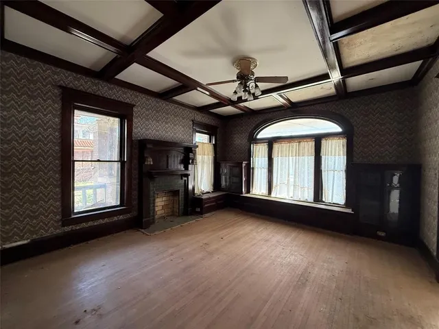 a bathroom with a toilet a sink and shower