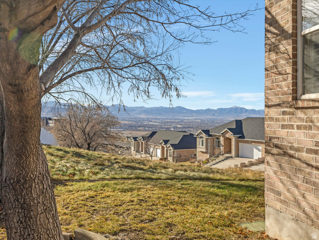 352 Haven Crest Road Draper, UT 84020 - Photo 37 of 44 Expansive hillside terrain featuring distant mountain ranges under a clear sky