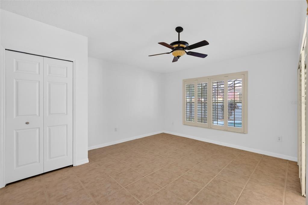 729 Strihal Loop Oakland, FL 34787 - Photo 23 of 49 a view of an empty room with a window
